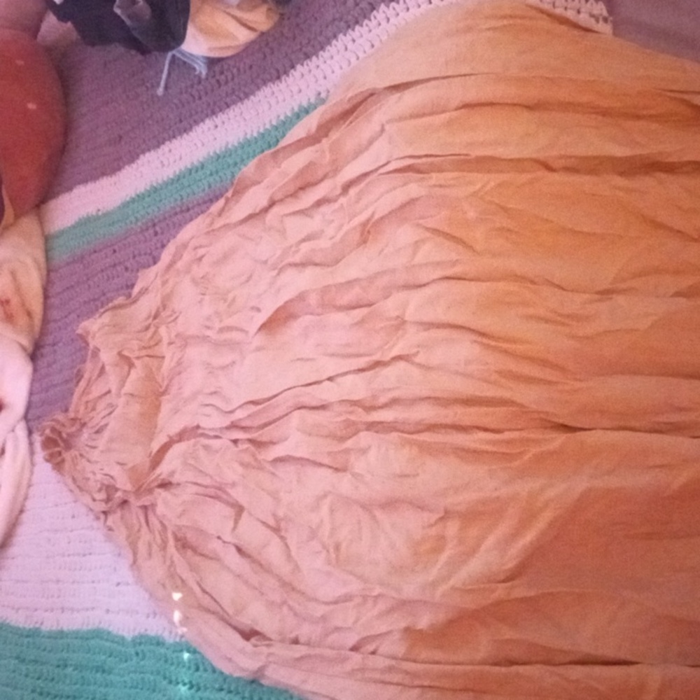 Cream dress with ties for the neck